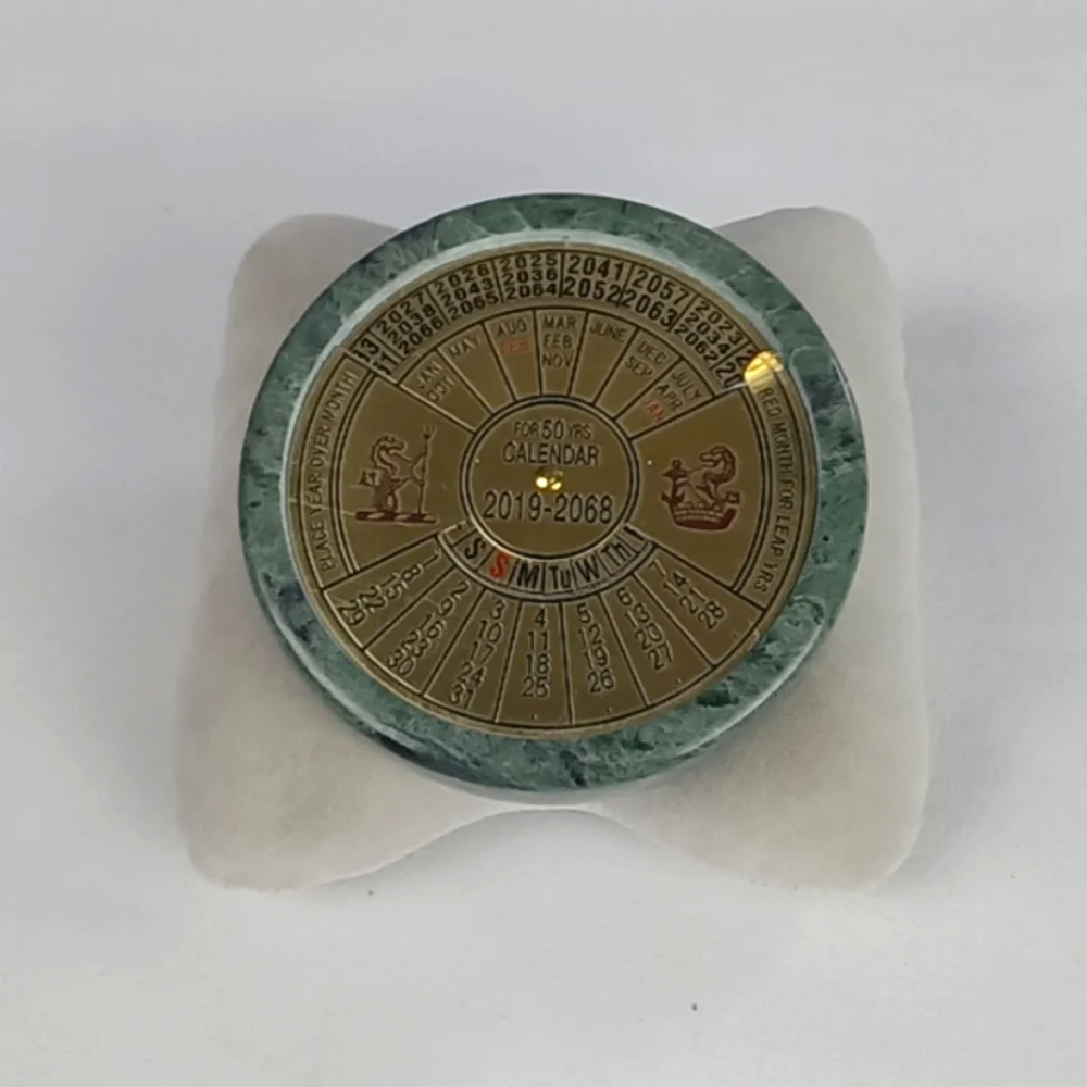 Perpetual Calendar Paper Weight.